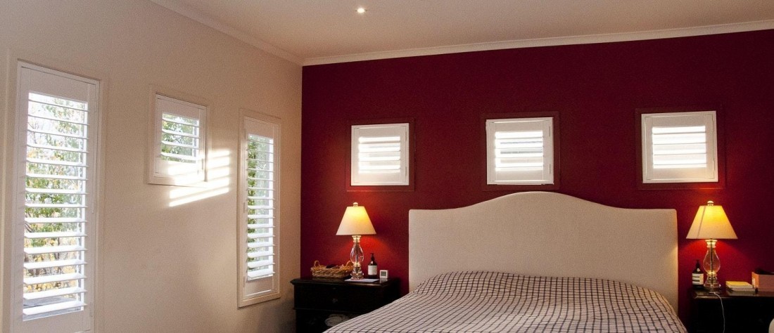 Various Custom Sized Window Plantation Shutters Installed in Master Bedroom