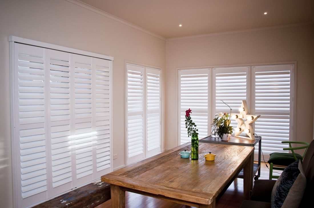 Plantation Shutters installed in Dining Area Semi-Closed for Reduced Light