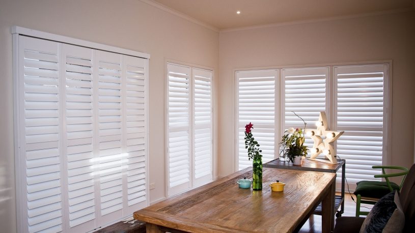 Plantation Shutters installed in Dining Area Semi-Closed for Reduced Light